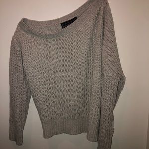 off-the-shoulder (right shoulder) sweater.